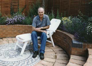 Malcolm with Medusa mosaic]